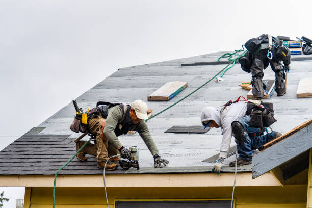 Professional Gutter Installation technician working in Massapequa Park, NY